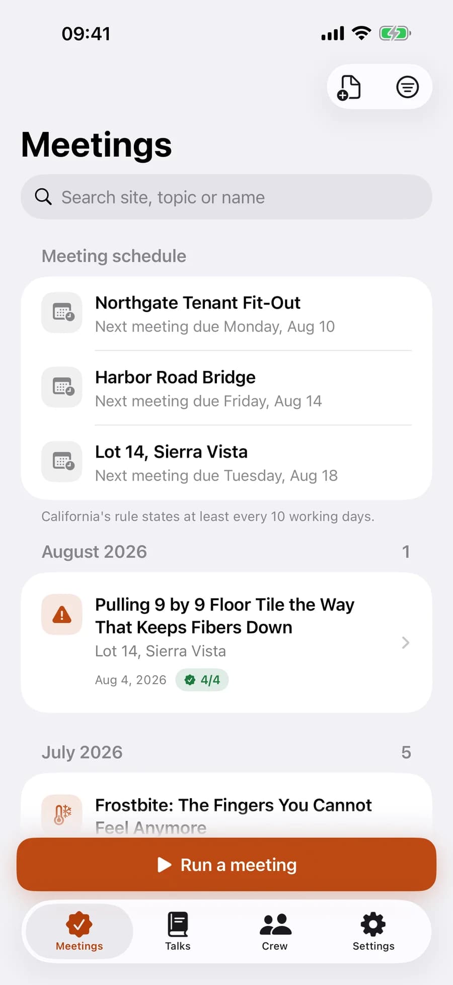 The Meetings tab: a meeting schedule listing three job sites with their next due dates, then signed meetings grouped by month, each showing the topic, the site, the date and how many of the crew signed.
