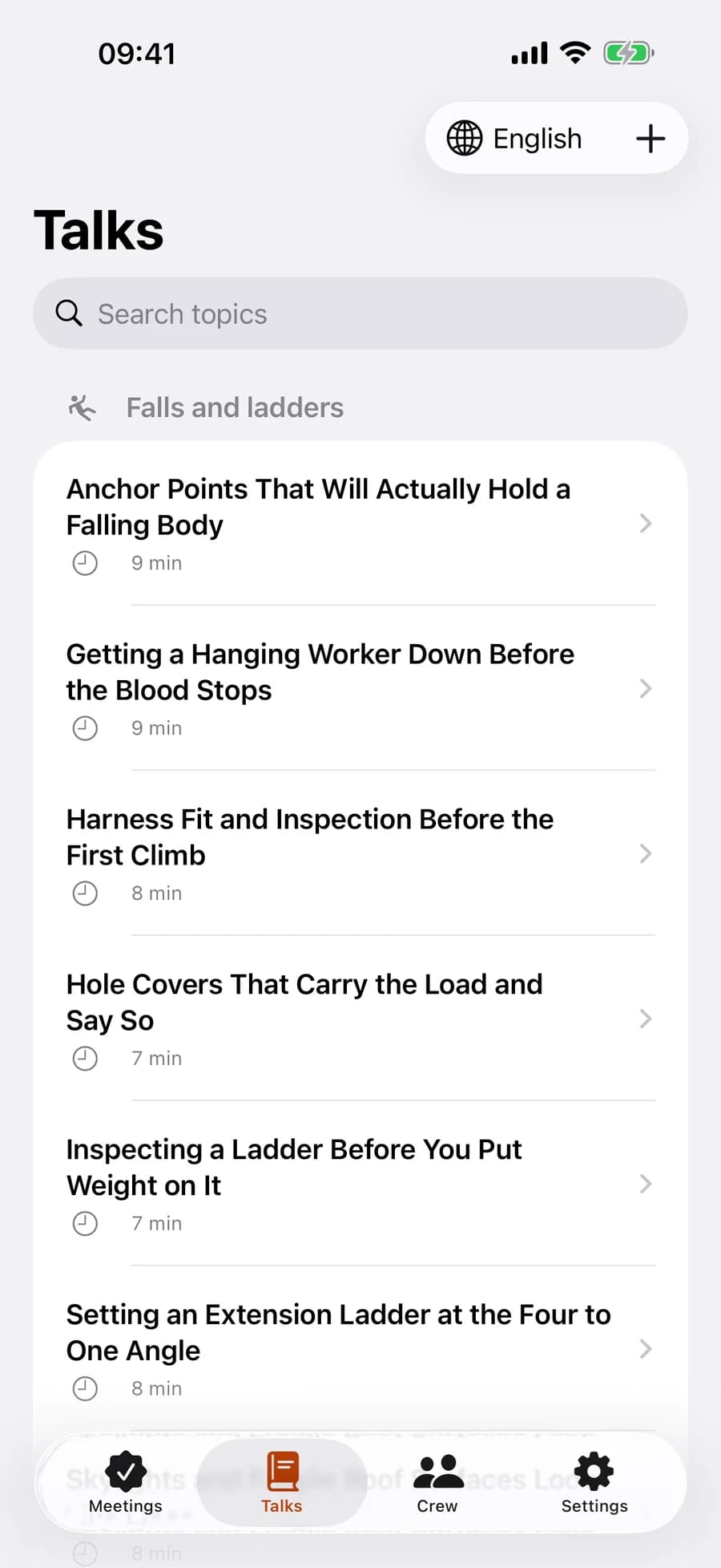 The Talks tab: safety talks grouped under Falls and ladders, each row showing the title and how many minutes it takes to read, with an English and Español switch at the top.